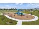 Modern playground with playset and surrounding landscaping at 14292 Swiss Bridge Dr, Riverview, FL 33579