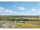 Community overview featuring a lake and surrounding homes at 14292 Swiss Bridge Dr, Riverview, FL 33579