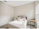Bright bedroom with double bed, nightstand, and window at 14292 Swiss Bridge Dr, Riverview, FL 33579