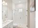 Clean bathroom with walk-in shower and white vanity at 14292 Swiss Bridge Dr, Riverview, FL 33579