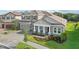 Two-story house with stone accents and landscaping at 14292 Swiss Bridge Dr, Riverview, FL 33579