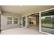 Screened patio with sliding glass doors leading to the living area at 14292 Swiss Bridge Dr, Riverview, FL 33579