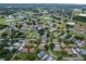 Aerial view showcasing a neighborhood's layout and landscaping at 2220 Grenadier Dr # 2220, Sun City Center, FL 33573