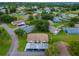 Aerial view of a home with carport in a community at 2220 Grenadier Dr # 2220, Sun City Center, FL 33573