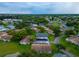 Aerial view of a community with houses and lush green landscape at 2220 Grenadier Dr # 2220, Sun City Center, FL 33573