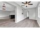 Bright dining area with wood-look flooring and ceiling fan at 2220 Grenadier Dr # 2220, Sun City Center, FL 33573