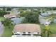 Aerial view of a single Gathering home in a residential area at 2220 Grenadier Dr # 2220, Sun City Center, FL 33573