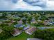 Aerial view of neighborhood with houses and green spaces at 2220 Grenadier Dr # 2220, Sun City Center, FL 33573