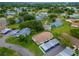 Aerial view of a residential property with a carport at 2220 Grenadier Dr # 2220, Sun City Center, FL 33573