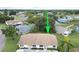 Aerial view of a single Gathering home in a residential area at 2220 Grenadier Dr # 2220, Sun City Center, FL 33573