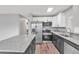 Modern kitchen with stainless steel appliances and granite countertops at 2220 Grenadier Dr # 2220, Sun City Center, FL 33573