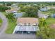 Aerial view showcasing a community of houses with ample green space at 2220 Grenadier Dr # 2220, Sun City Center, FL 33573