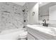 Updated bathroom with granite vanity and marble shower at 2220 Grenadier Dr # 2220, Sun City Center, FL 33573