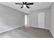 Bedroom with ceiling fan and closet at 2220 Grenadier Dr # 2220, Sun City Center, FL 33573