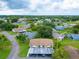 Aerial view of community with houses, roads, and green spaces at 2220 Grenadier Dr # 2220, Sun City Center, FL 33573