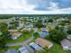 Aerial view of community featuring various houses and lush greenery at 2220 Grenadier Dr # 2220, Sun City Center, FL 33573