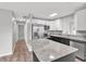 Updated kitchen featuring stainless steel appliances and granite countertops at 2220 Grenadier Dr # 2220, Sun City Center, FL 33573