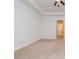 Bright and airy bedroom with carpeted floor and hallway access at 6948 Silver Sage Cir, Tampa, FL 33634