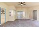 Large screened patio with brick pavers and sliding glass doors leading to the backyard at 6948 Silver Sage Cir, Tampa, FL 33634