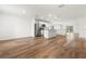 Open kitchen with stainless steel appliances and island at 5093 Burnside St, North Port, FL 34291