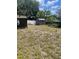 Backyard with shed and screened enclosure at 10007 N 26Th St, Tampa, FL 33612