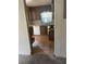 Small kitchen with wood cabinets and tiled floor at 10007 N 26Th St, Tampa, FL 33612