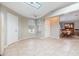 Bright kitchen with tile floors and white cabinets at 6928 Stephens Path, Zephyrhills, FL 33542