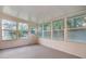 Sunroom boasts ample natural light and provides a relaxing space at 6928 Stephens Path, Zephyrhills, FL 33542