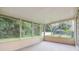 Spacious screened porch overlooking backyard with pool at 6928 Stephens Path, Zephyrhills, FL 33542
