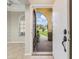 Inviting entryway with view of front yard and walkway at 6928 Stephens Path, Zephyrhills, FL 33542