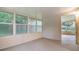 Cozy screened porch with ample natural light at 6928 Stephens Path, Zephyrhills, FL 33542