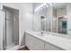 Clean bathroom with a large vanity and walk-in shower at 6928 Stephens Path, Zephyrhills, FL 33542
