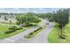 Aerial view of community entrance and surrounding landscape at 6928 Stephens Path, Zephyrhills, FL 33542