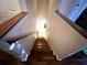 Wooden staircase leading to the upper level at 3316 Thistledown Ln, Land O Lakes, FL 34638