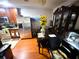 Kitchen dining area with dark wood table and chairs at 3316 Thistledown Ln, Land O Lakes, FL 34638