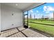 Relaxing covered lanai with brick flooring, views of the backyard, and a great spot for enjoying nature at 4717 Blue Star Ct, North Port, FL 34289