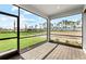 Private screened lanai overlooking a green backyard at 4717 Blue Star Ct, North Port, FL 34289