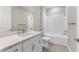 Clean bathroom with single vanity, bathtub, and modern fixtures at 4717 Blue Star Ct, North Port, FL 34289