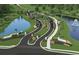 Gated community entrance with landscaping and a pond at 4717 Blue Star Ct, North Port, FL 34289