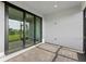 Covered lanai with tile flooring and view of backyard at 4717 Blue Star Ct, North Port, FL 34289