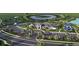Community clubhouse with pool, tennis, and pickleball courts at 4717 Blue Star Ct, North Port, FL 34289