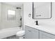 Modern bathroom with tub, shower, and integrated vanity at 801 Brodhag Dr, Punta Gorda, FL 33950