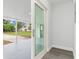 View from inside to exterior patio with sliding glass door, showing white trim and ceiling at 801 Brodhag Dr, Punta Gorda, FL 33950