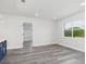 Bright living room featuring modern gray flooring and neutral color palette at 801 Brodhag Dr, Punta Gorda, FL 33950