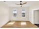 Bright and airy bedroom with hardwood floors and a ceiling fan at 1207 E 17Th Ave, Tampa, FL 33605