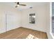 Spacious bedroom with hardwood floors and plenty of natural light at 1207 E 17Th Ave, Tampa, FL 33605