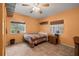 Bedroom with a double bed and ceiling fan at 16637 Livingston Ave, Lutz, FL 33559