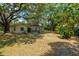 Ranch style home with mature trees at 16637 Livingston Ave, Lutz, FL 33559