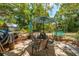Outdoor patio with table, chairs, and umbrella at 16637 Livingston Ave, Lutz, FL 33559