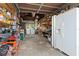 Laundry room with washer, dryer and storage at 16637 Livingston Ave, Lutz, FL 33559